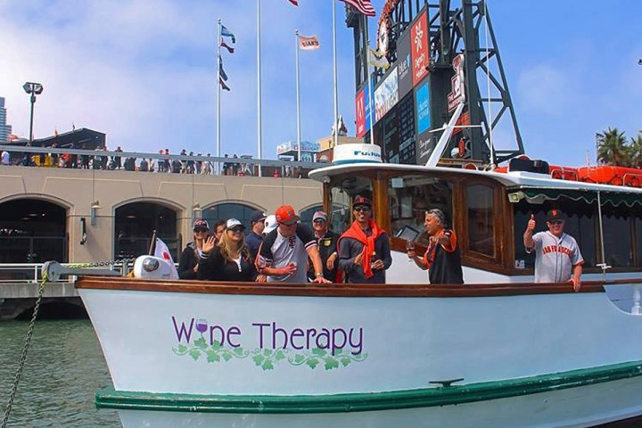 a boat is docked next to a body of water