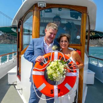 wedding couple on the bow of wine therapy after getting married
