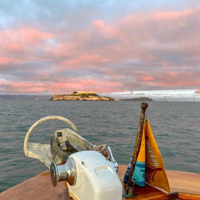 a boat sitting on top of a body of water