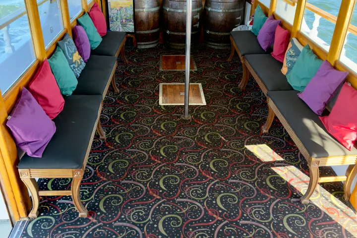 Wine Therapy heated cabin interior with panoramic windows showing San Francisco skyline and Bay Bridge